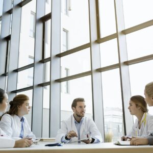 Group of doctors in meeting with consultant