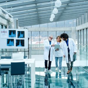 Group of doctors talking about corona virus on conference, midsection