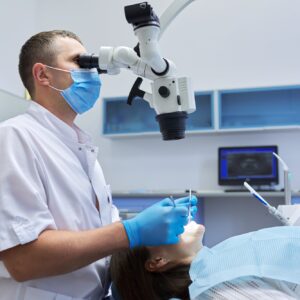 Healthcare dentistry medicine, male doctor dentist treating teeth