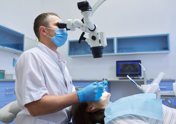 Healthcare dentistry medicine, male doctor dentist treating teeth Healthcare dentistry medicine, male doctor dentist treating teeth